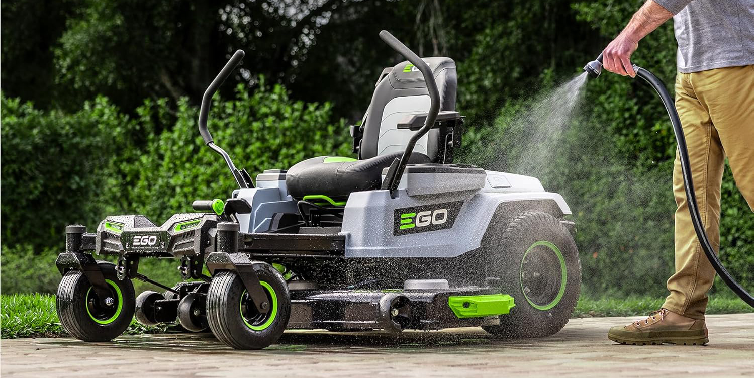A lawn mower spraying water
