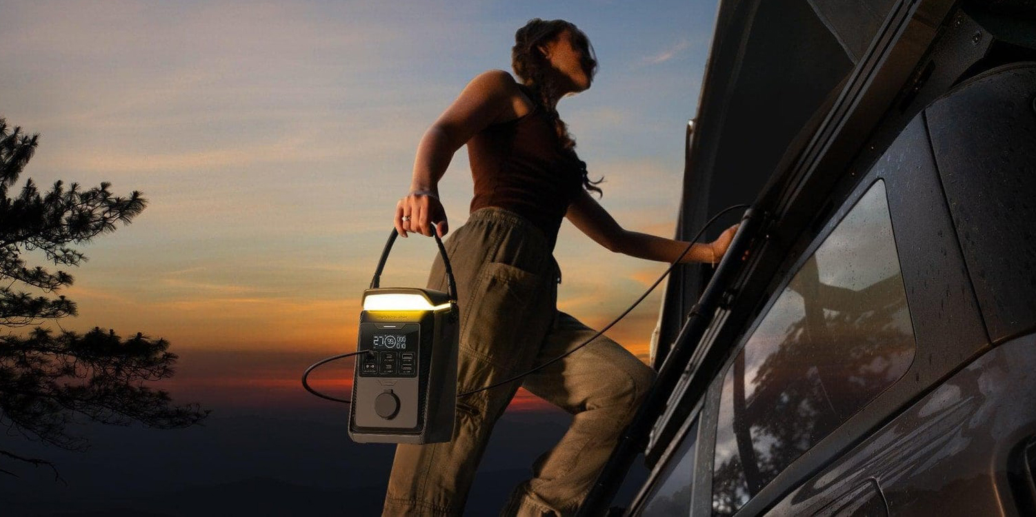 A woman holding a radio