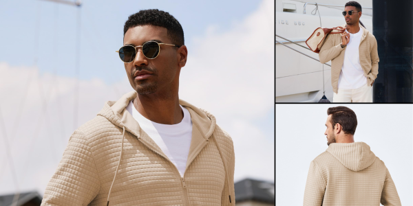 A man wearing sunglasses and a jacket