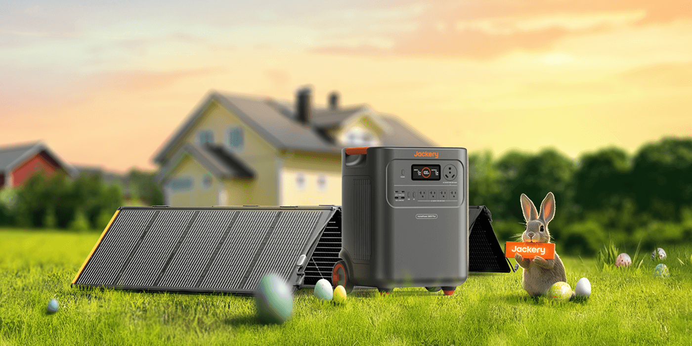 A solar panel and a box on grass