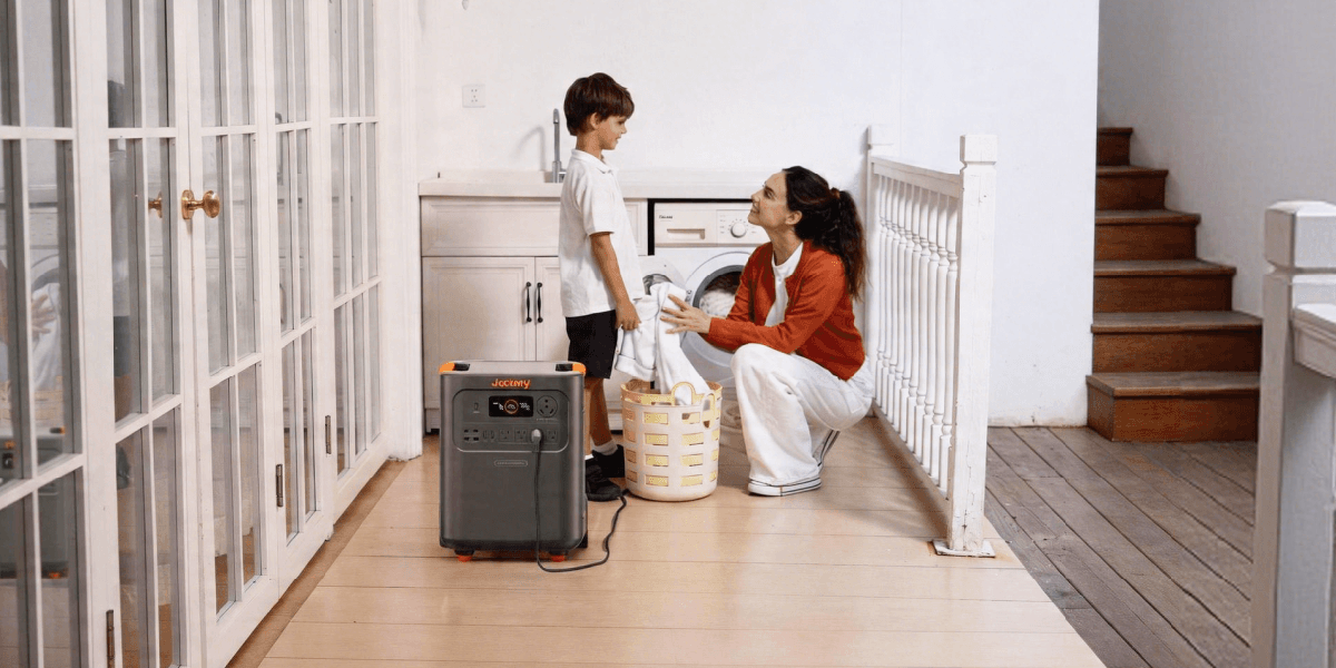 A woman and a boy in a laundry room