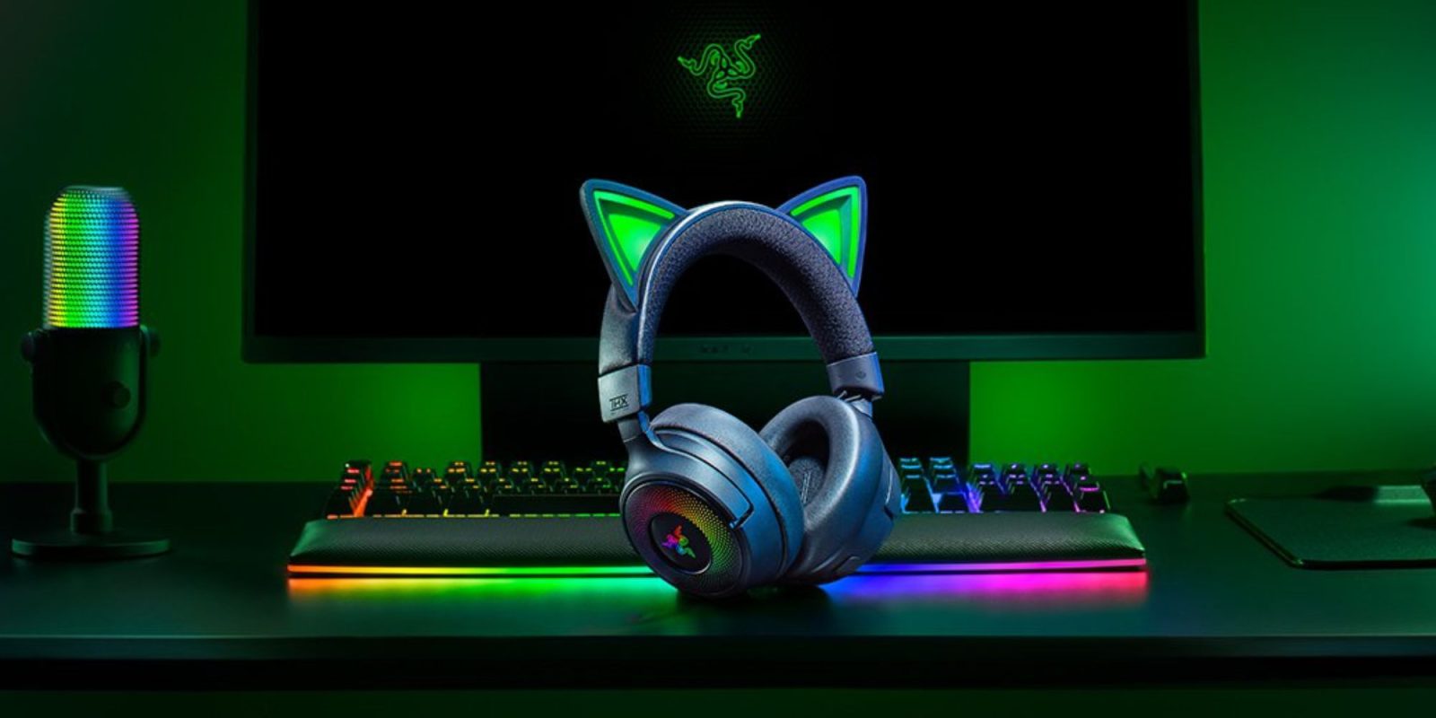 A headphones with cat ears on a keyboard