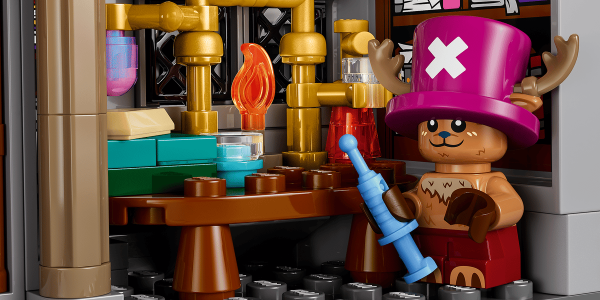 A toy building blocks with a bear and a hat