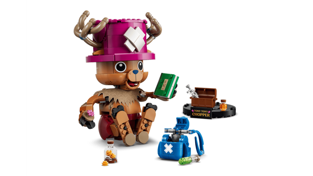 A toy bear with a book and a backpack