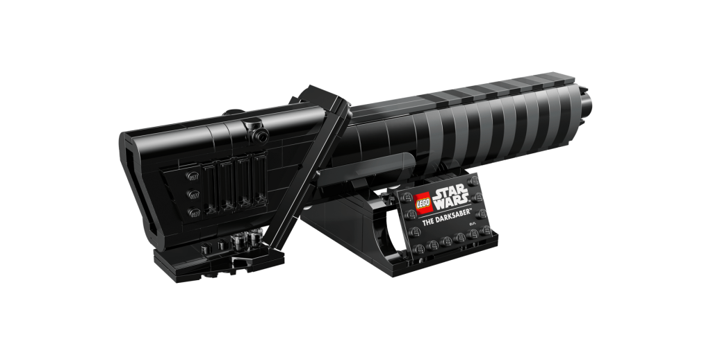 A black toy gun with a black background