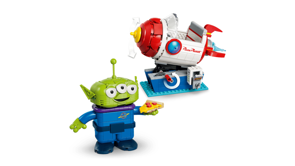 A toy figures of a alien and a rocket
