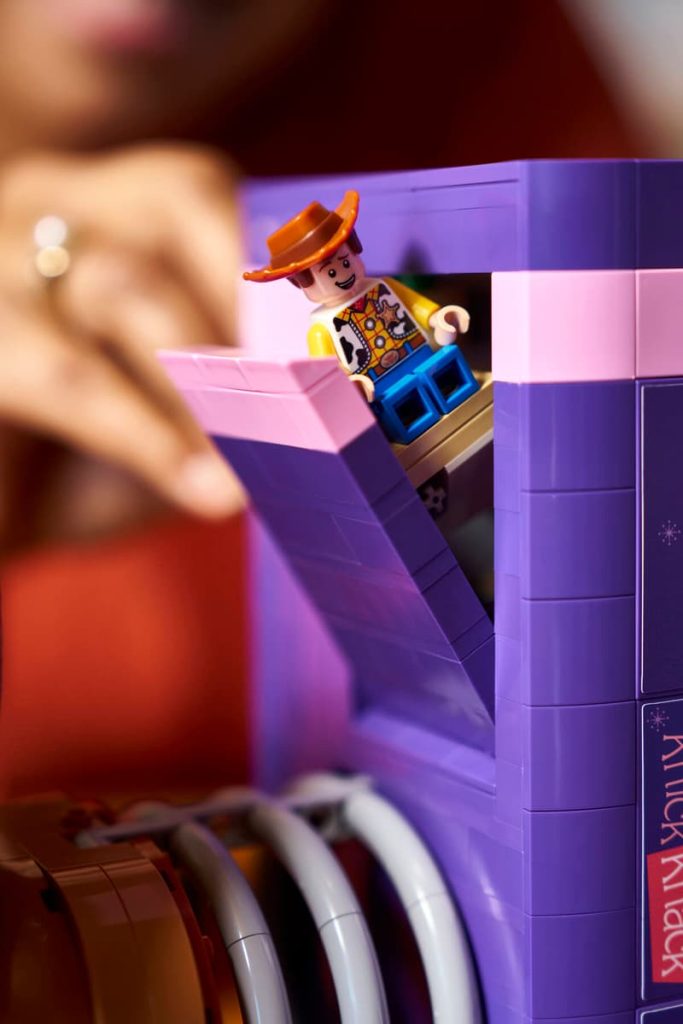 A toy figurine in a purple box