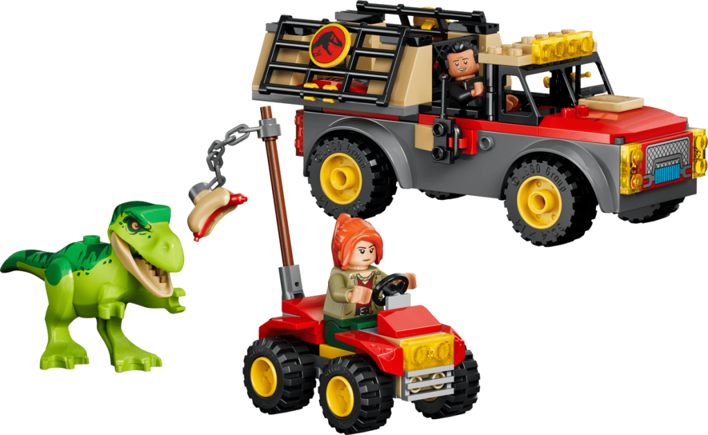 A toy vehicle and a toy dinosaur