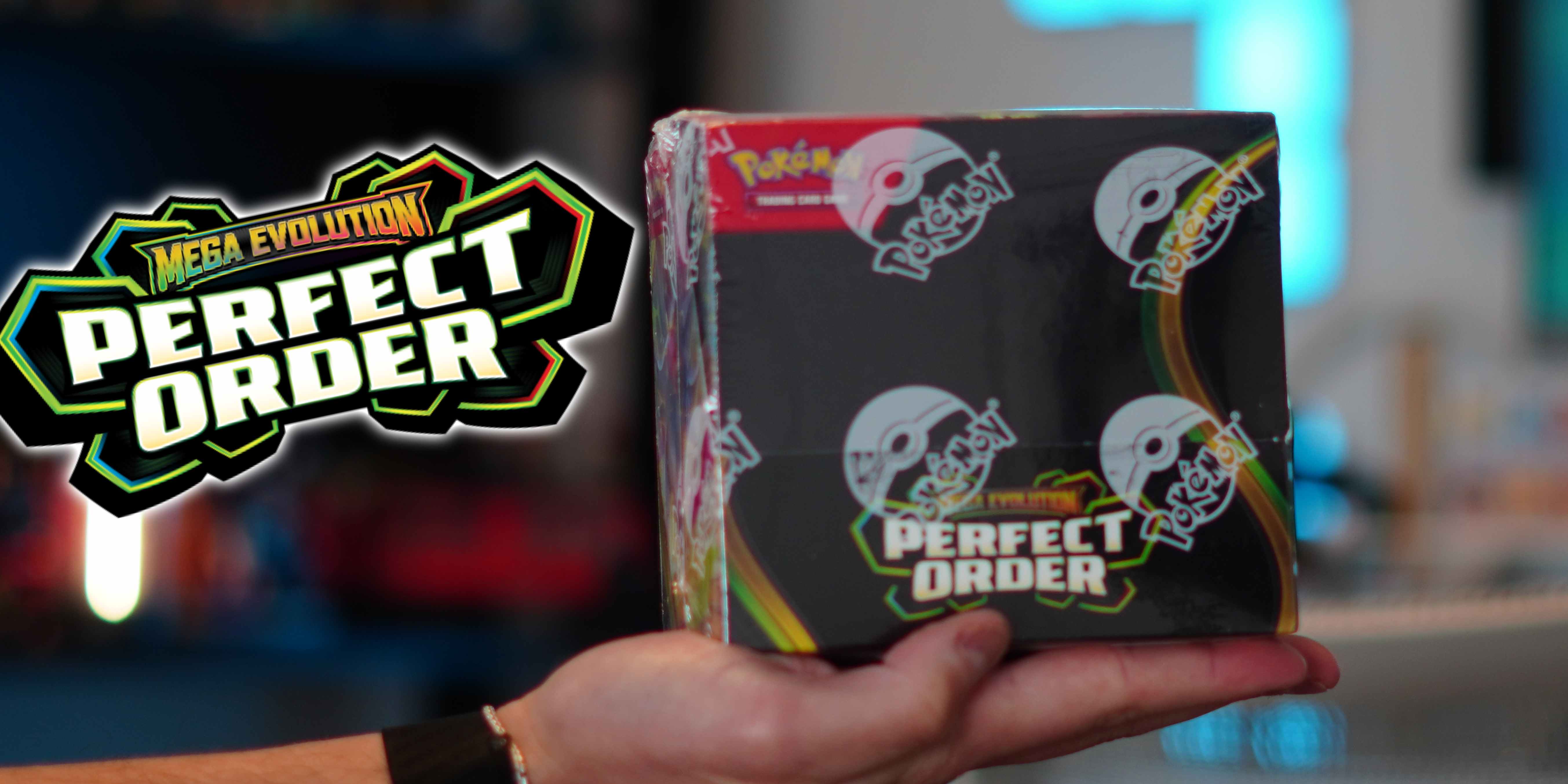 A hand holding a box with a logo