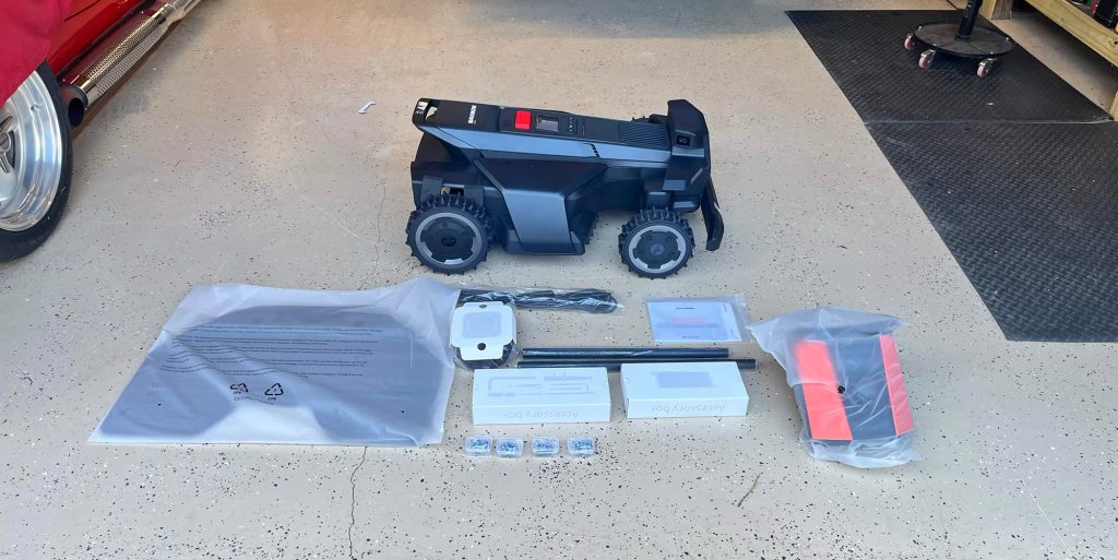 A black robot on a floor