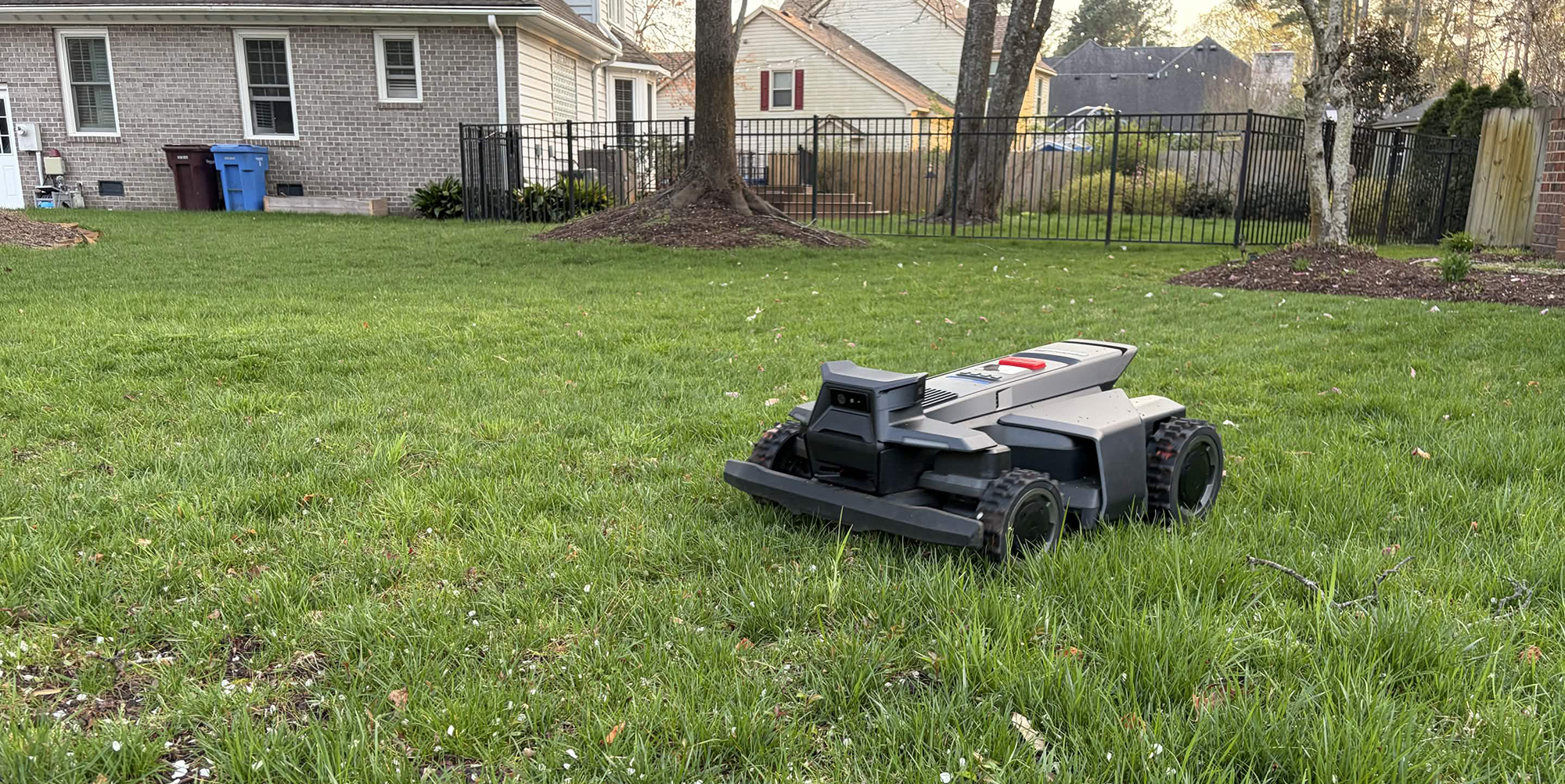 A lawnmower in a yard