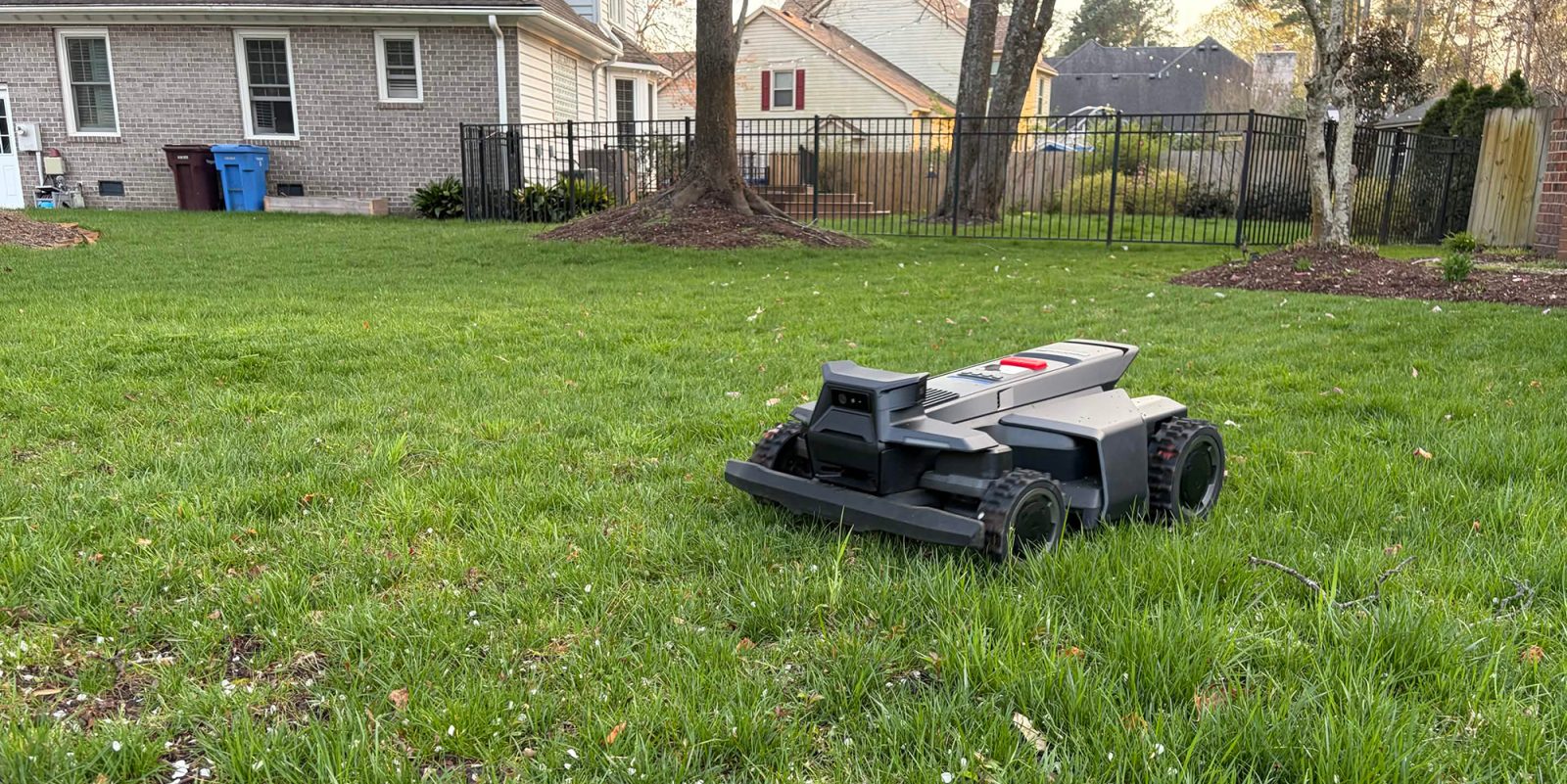 A lawnmower in a yard