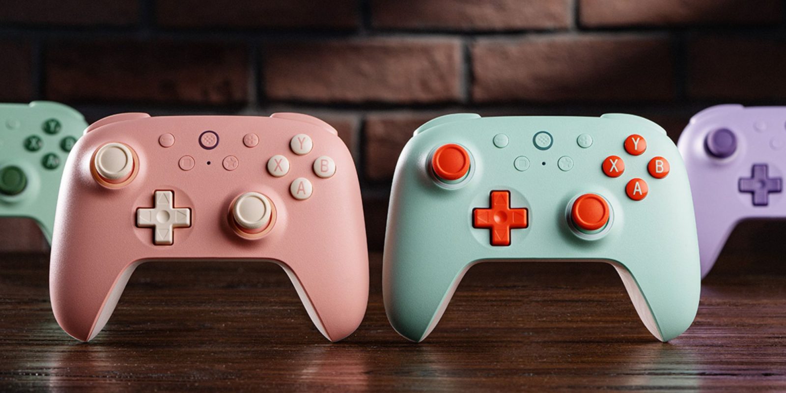 A pink and blue video game controllers