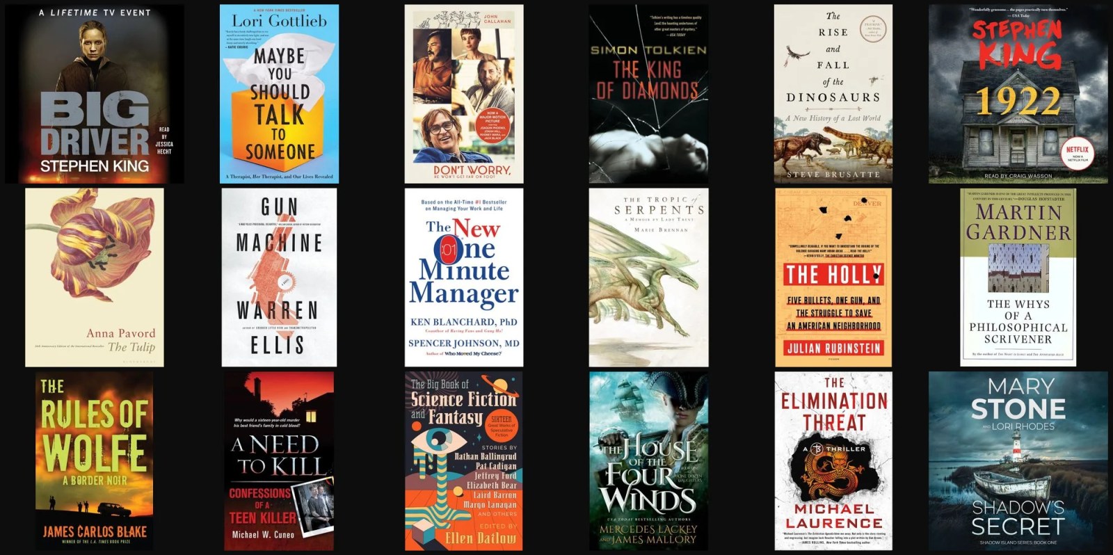 A group of books on a black background