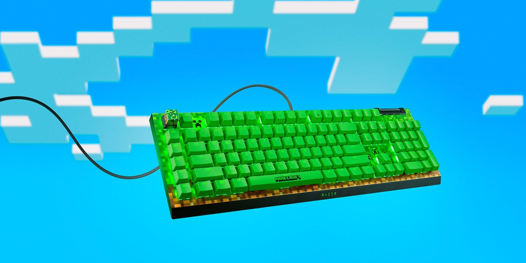 A green keyboard with a wire