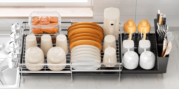 A dish drying rack with plates and cups