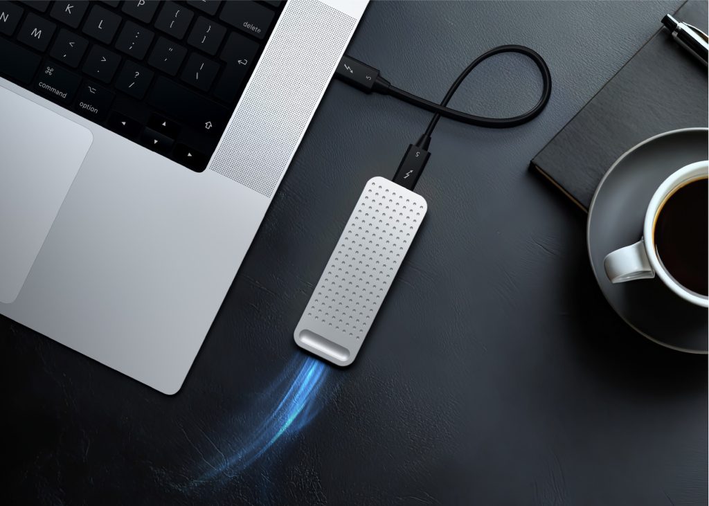 A laptop computer with a power cable
