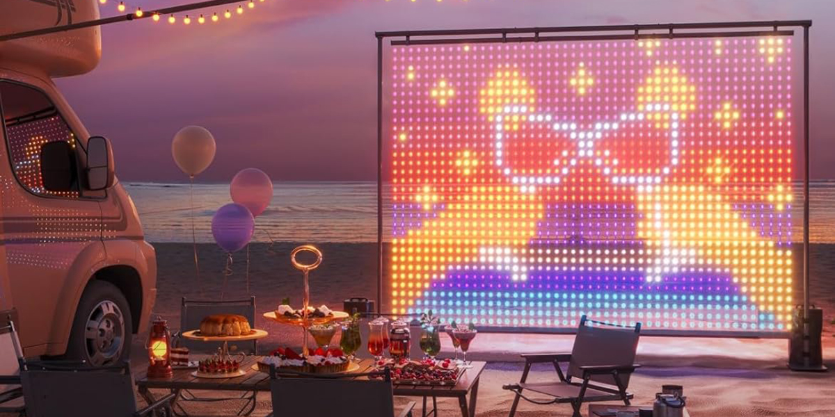 A table with food and balloons on it