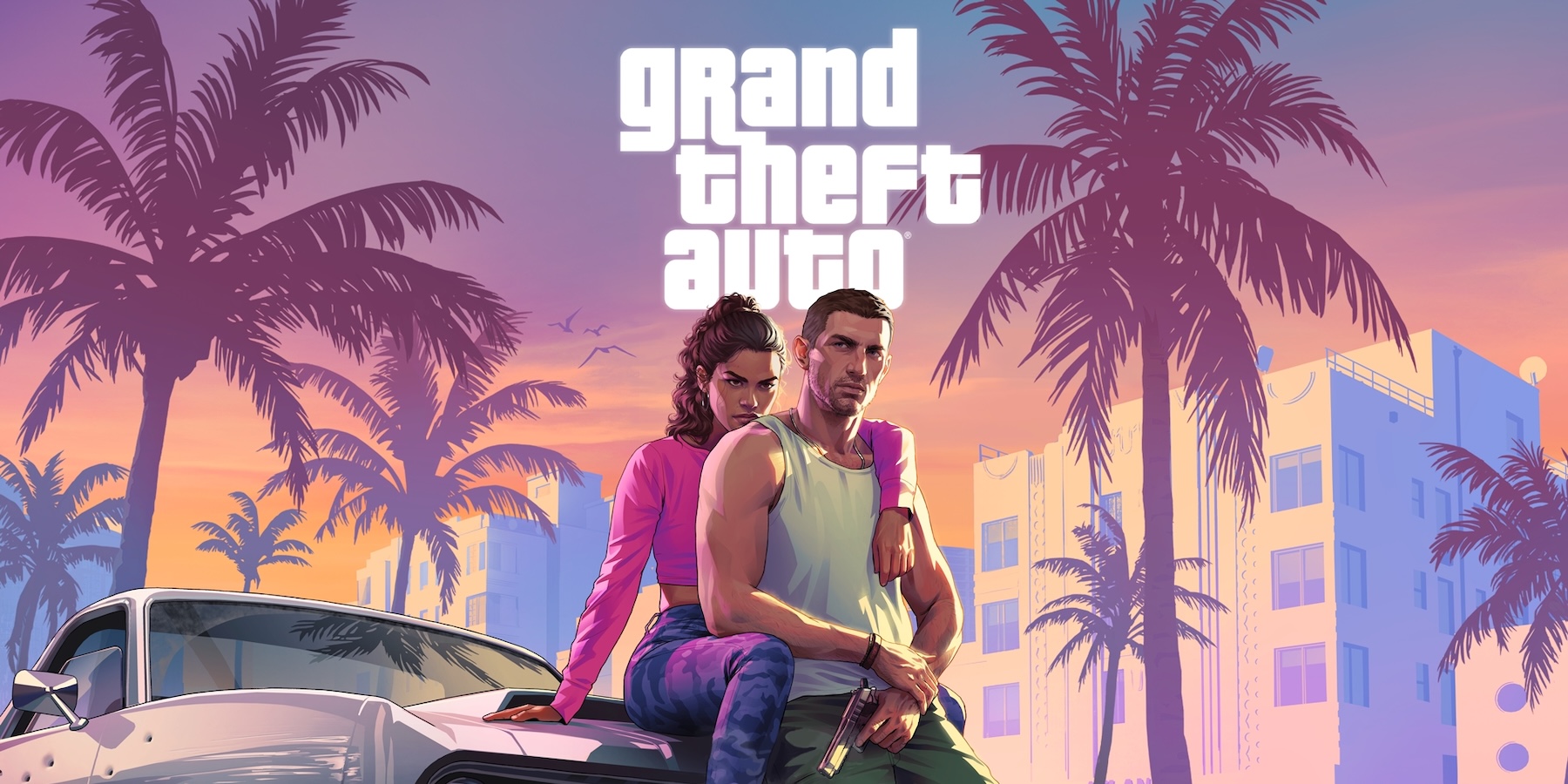 A man and woman sitting on a car