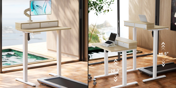 A computer desk with a laptop on it