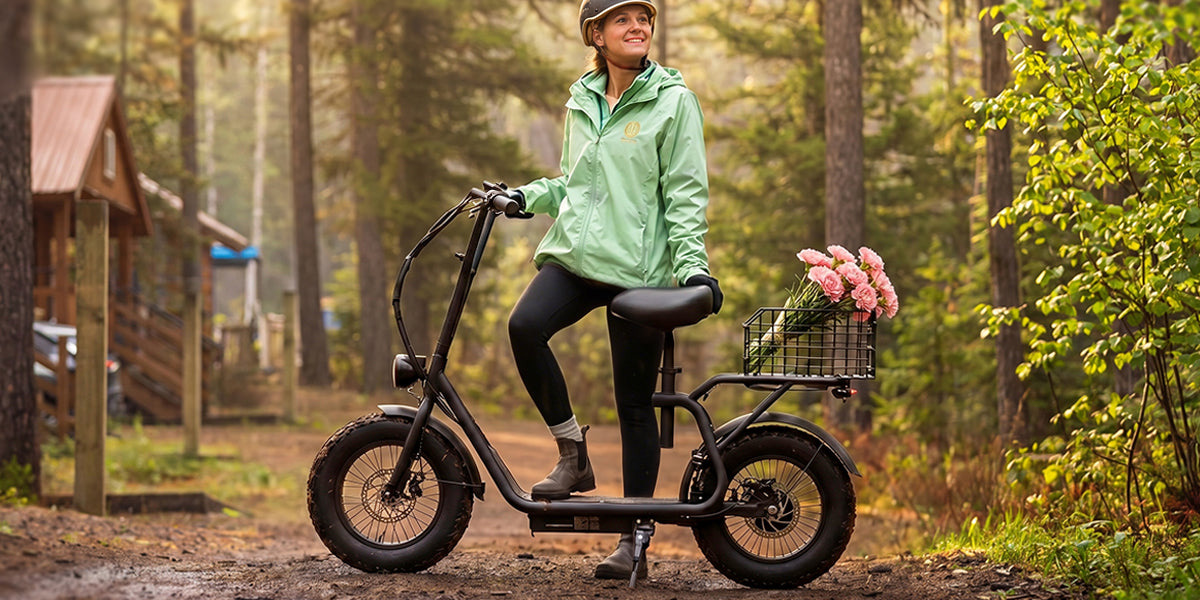A woman on a bike with flowers in a basket