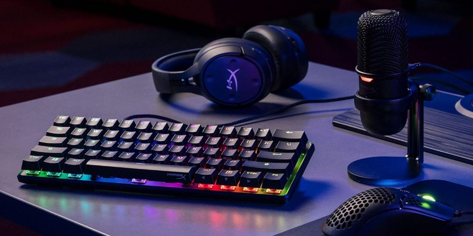 A keyboard and headphones on a desk