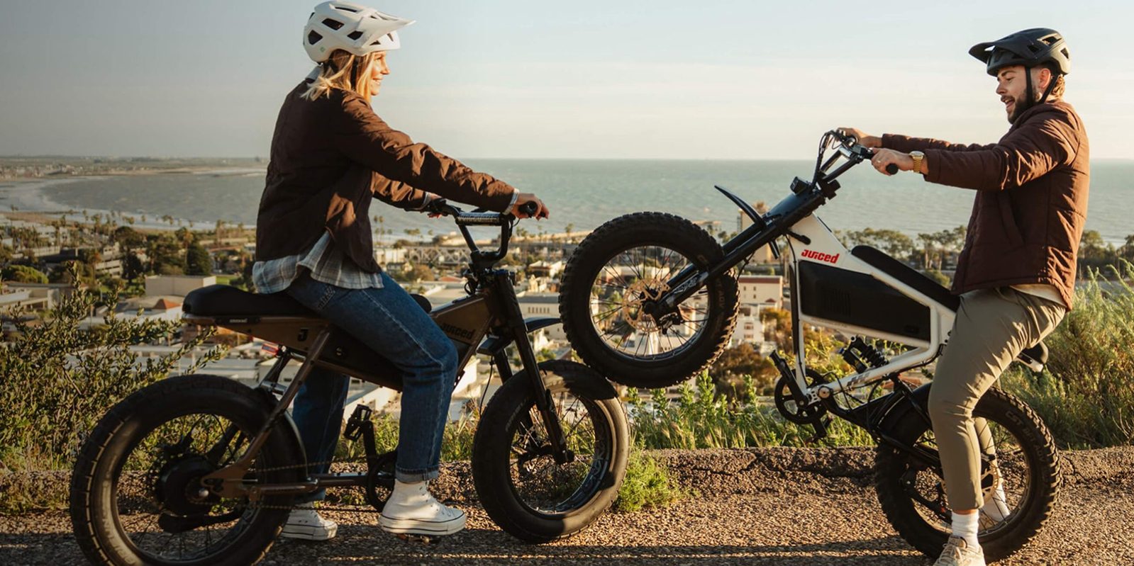A woman on a bike with two wheels