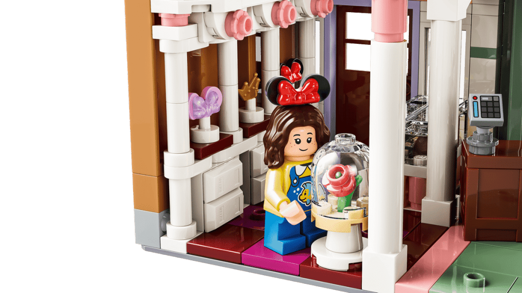 A lego building blocks with a girl in front of a flower shop