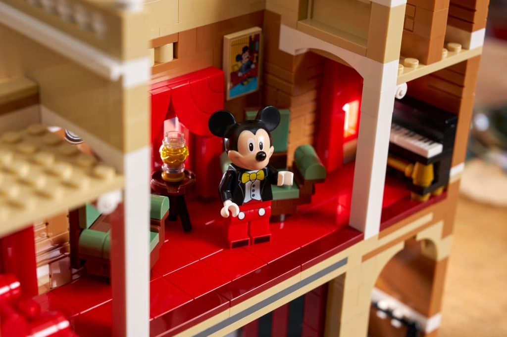 A toy building with a mickey mouse figure