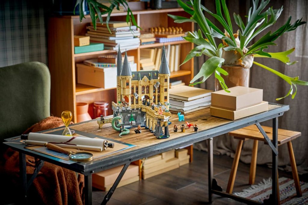 A table with a toy castle and books
