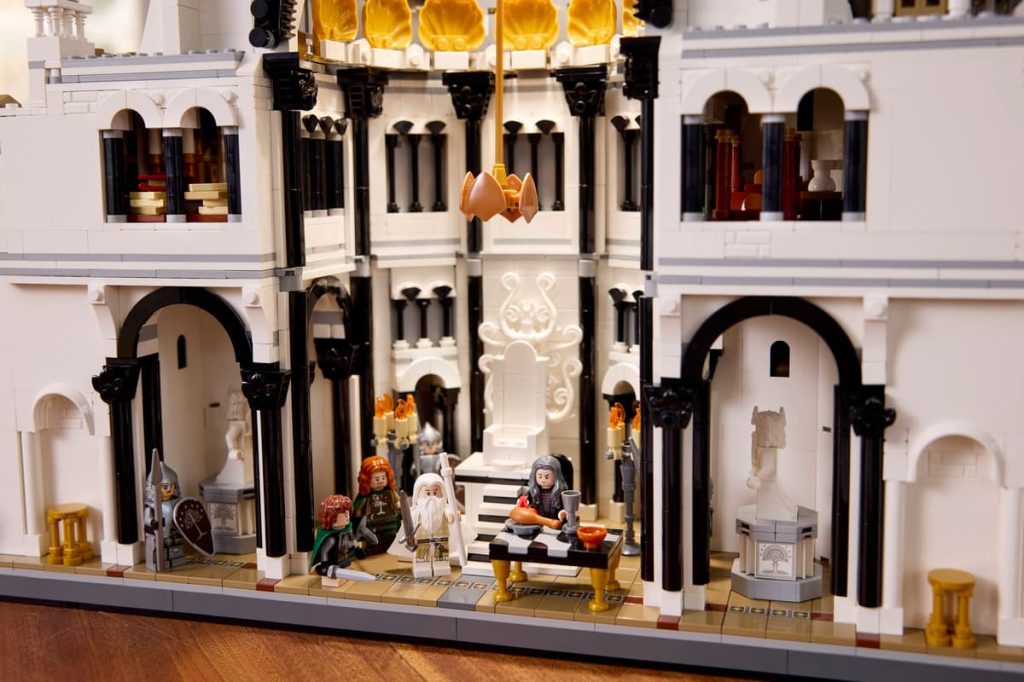 A toy building with a building and people