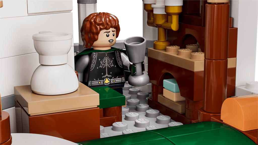 A lego figure with a silver object