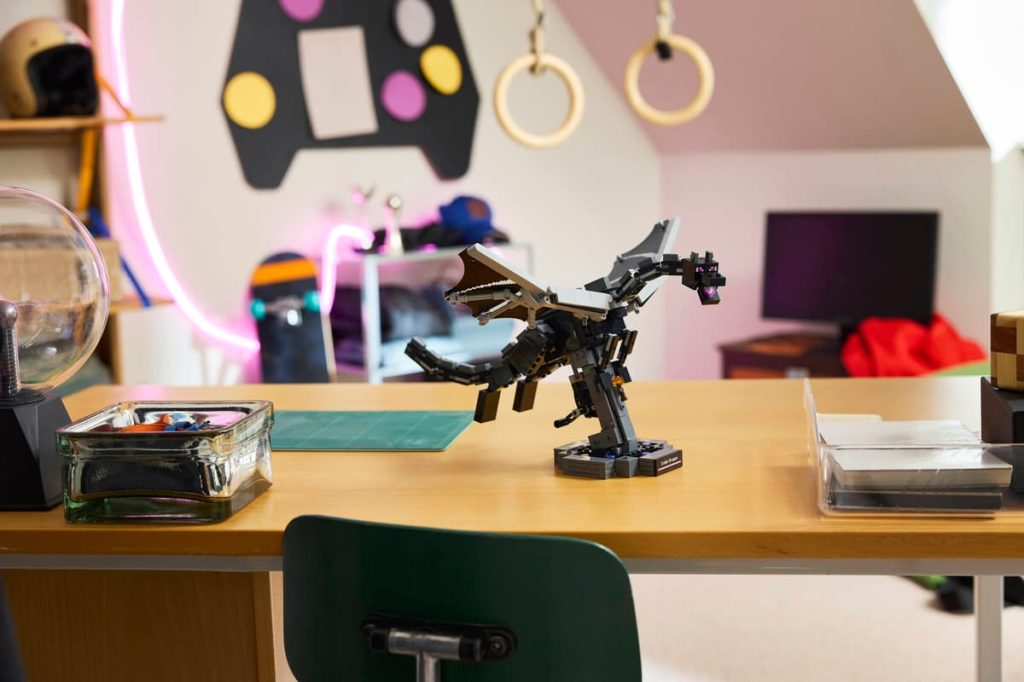 A toy dragon on a desk