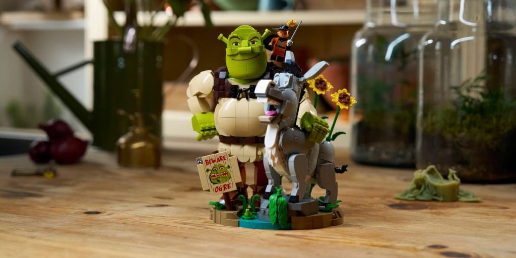 A toy figurine of a man and a donkey