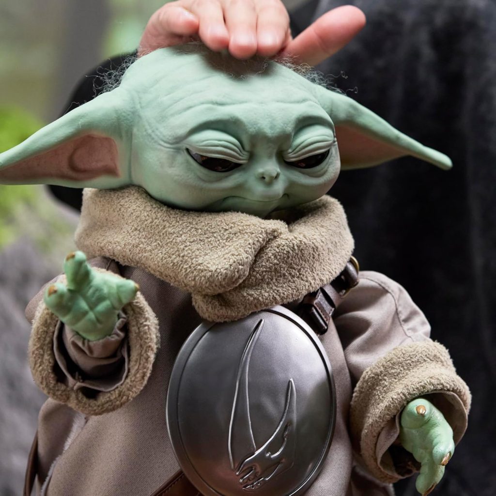 A person touching a toy