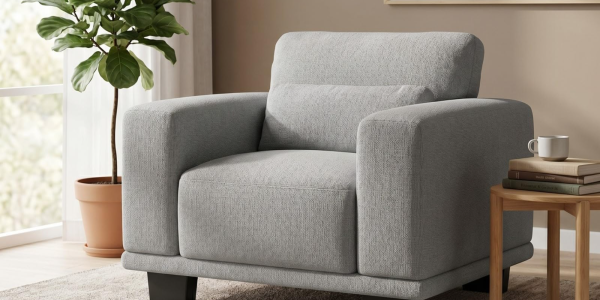 A grey chair in a room