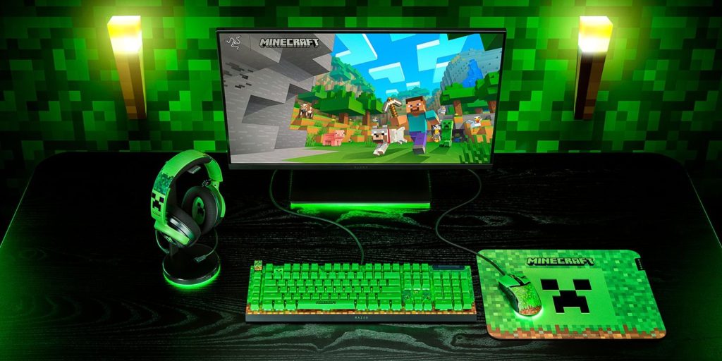 A computer with a keyboard and headphones