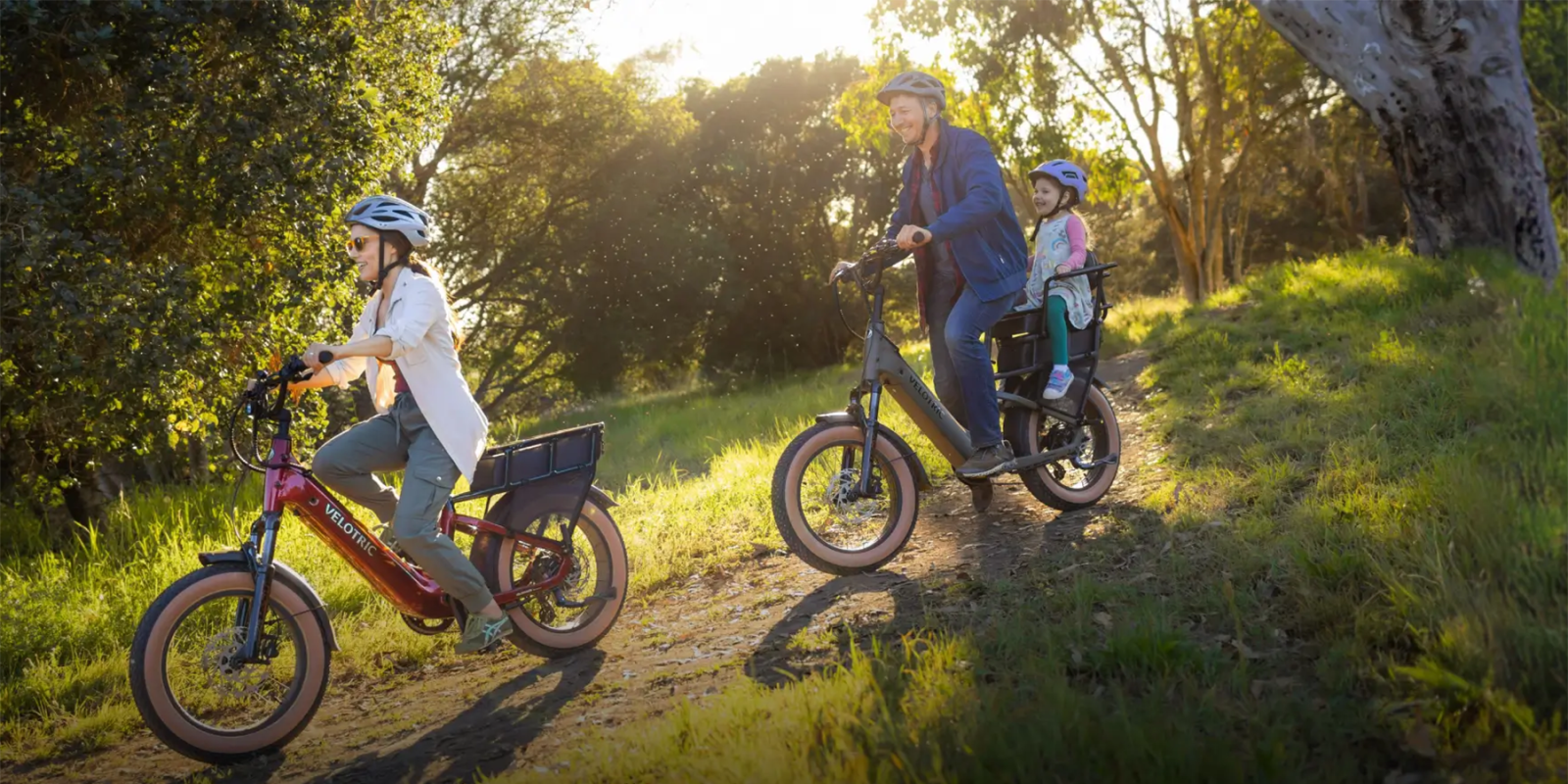 A group of people riding bikes and a child on a bike