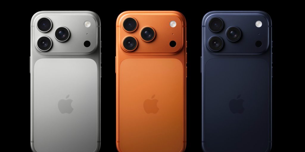 A group of cell phones with camera lenses