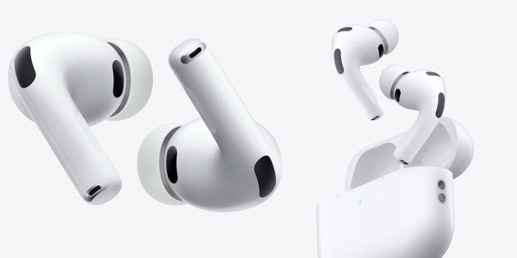 A group of white earbuds