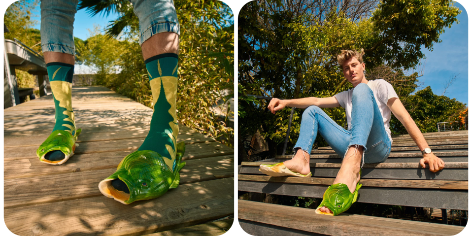 A man sitting on a bench with a fish shoe