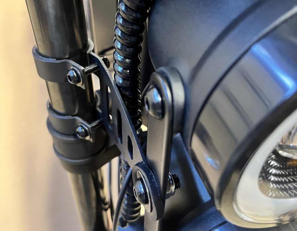 A close up of a black metal pipe