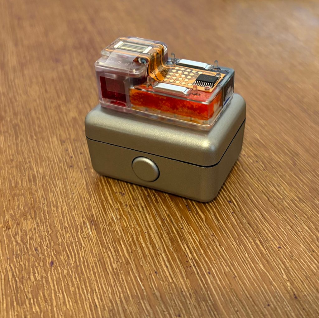 A small electronic device on a table