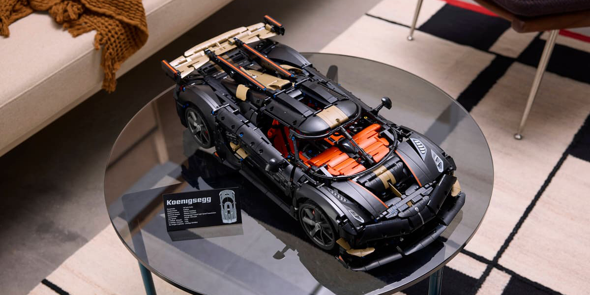 A toy car on a glass table