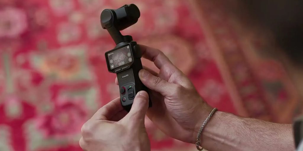 A person holding a camera