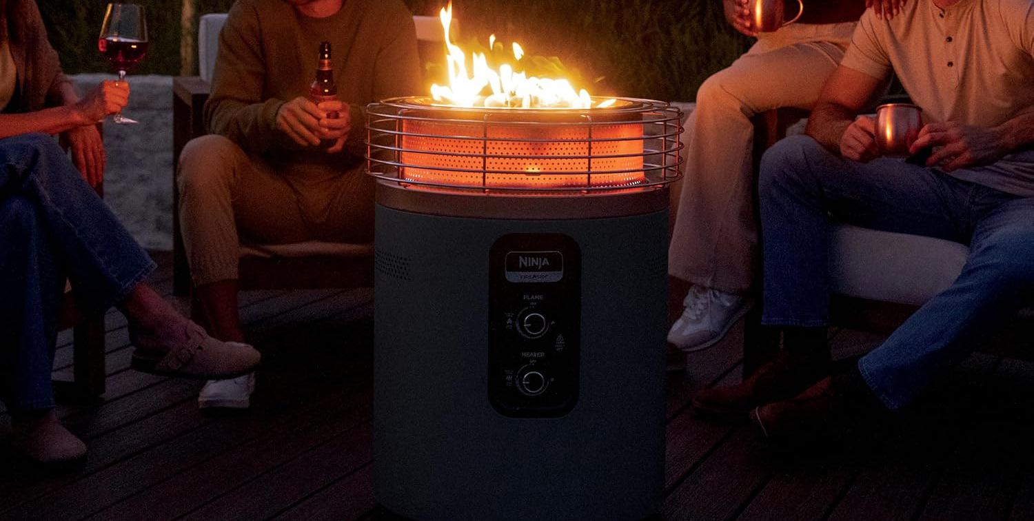 A fire pit with people sitting around