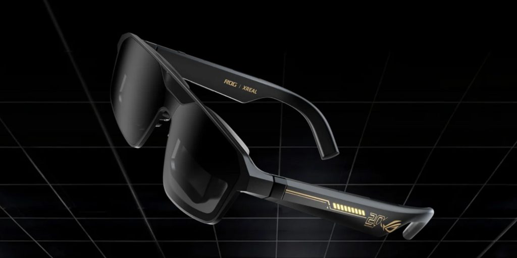 A black sunglasses with gold accents