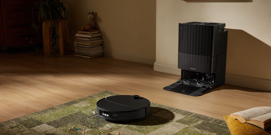 A robot vacuum cleaner on a rug