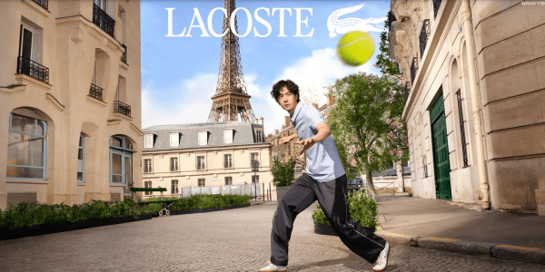 A man throwing a tennis ball