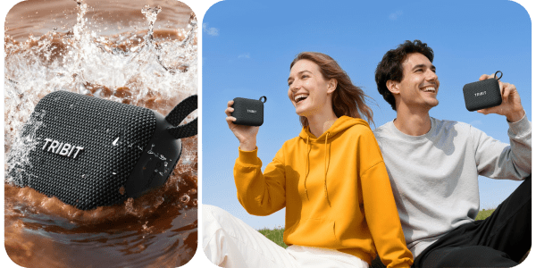 A man and woman smiling and holding a speaker
